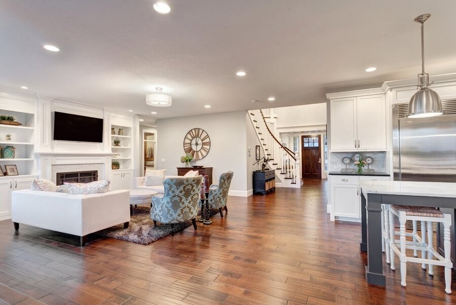 An open living space featuring several smart home automation solutions.
