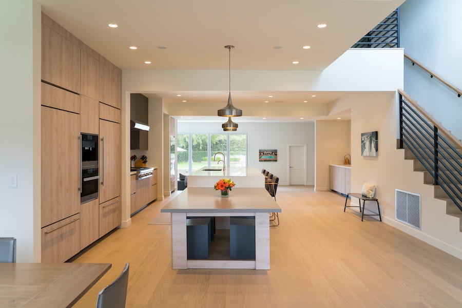 A kitchen illuminated by warm Ketra lighting.