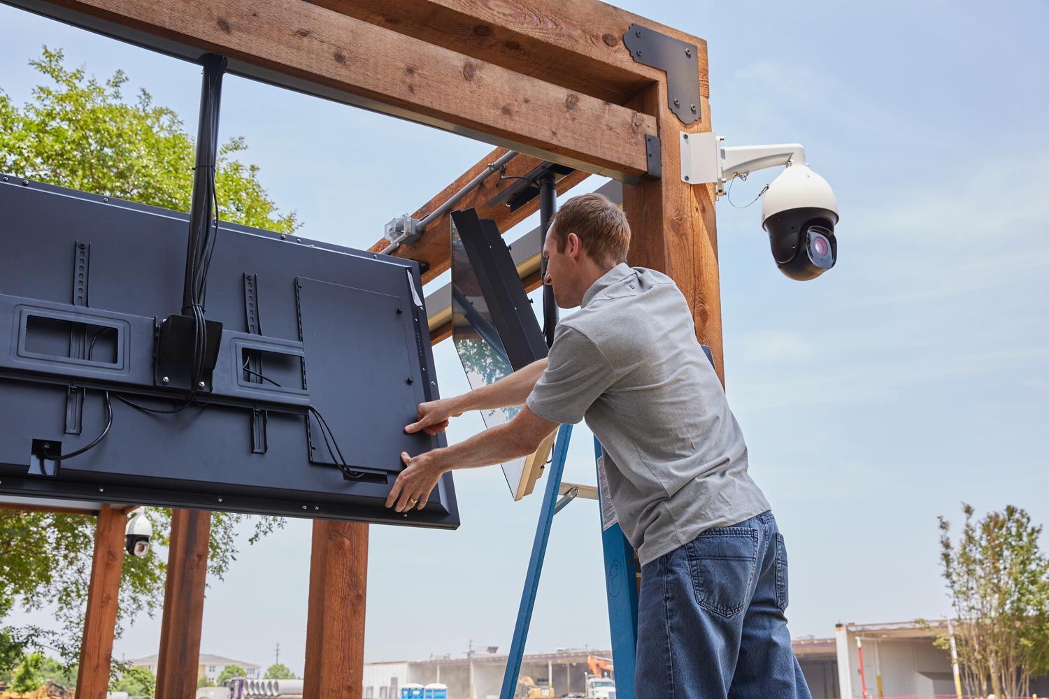 Person installing TV
